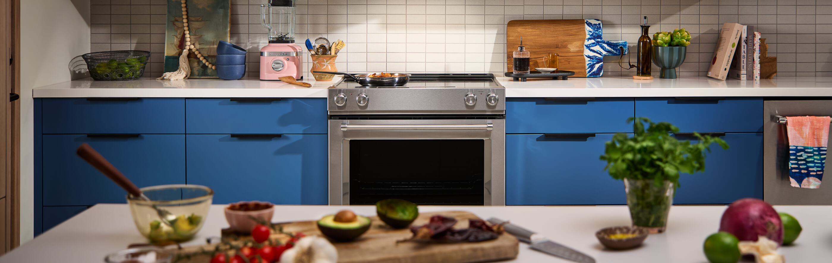 Produce on a cutting board in a modern kitchen