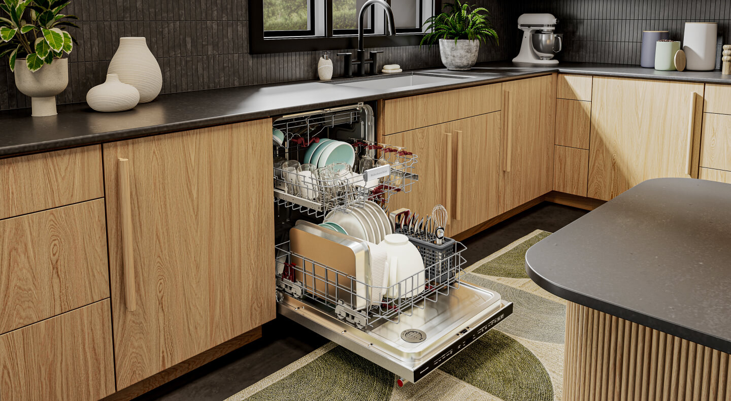 Open and loaded KitchenAid® dishwasher in natural wood cabinetry