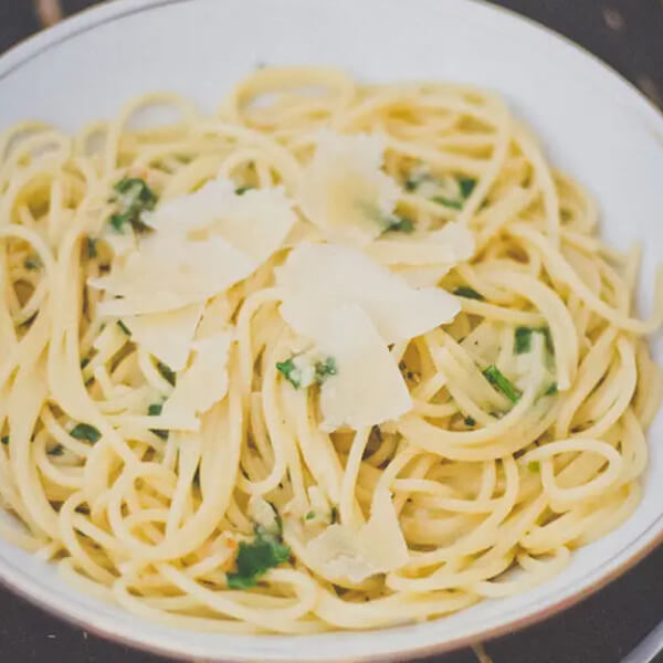 Pasta with slivers of cheese