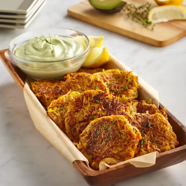 Vegetable fritters with creamy green avocado dip.