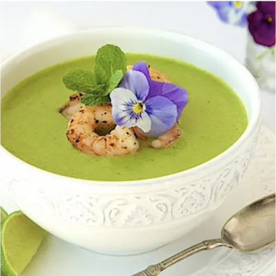 A bowl of asparagus and shrimp coconut curry