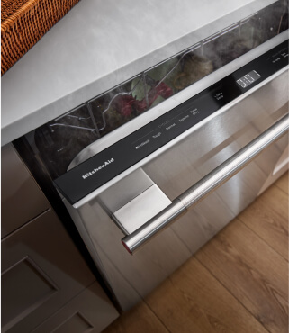 A closeup of the controls on a dishwasher
