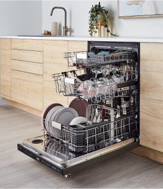 An open dishwasher with dishes inside