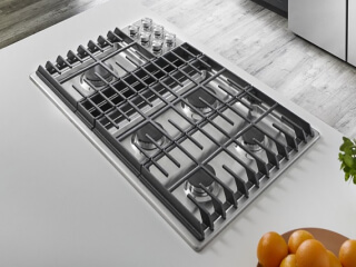 A KitchenAid® cooktop in a kitchen