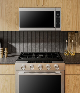 A KitchenAid® range and microwave in a kitchen