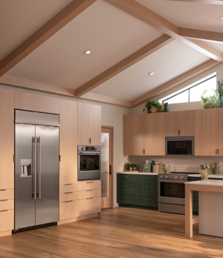 A large kitchen with high ceilings and brown cabinetry