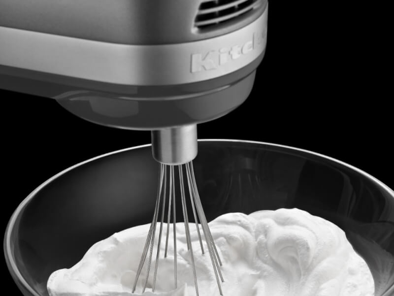 Close-up of cream being whipped with a KitchenAid® stand mixer Close-up of cream being whipped with a KitchenAid® stand mixer