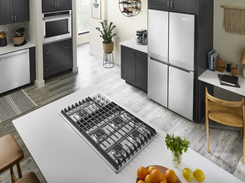 Overhead view of a downdraft gas range set into the island of a kitchen Overhead view of a downdraft gas range set into the island of a kitchen