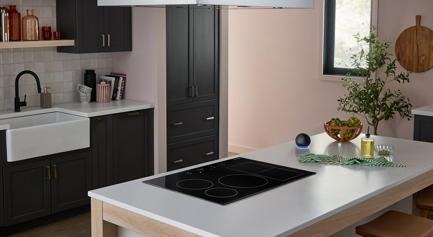 Five-burner cooktop installed in an island countertop