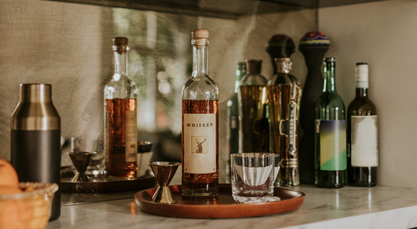 Various alcohol bottles on a shelf
