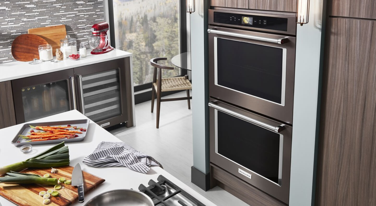 A sleek double wall oven in a modern kitchen