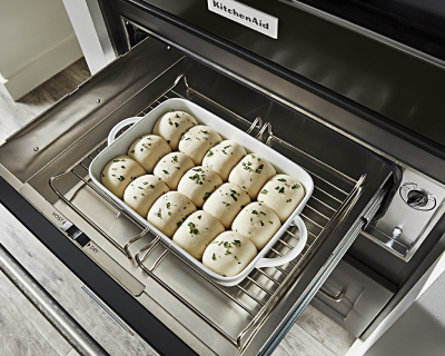 Herb rolls proofing in a warming drawer
