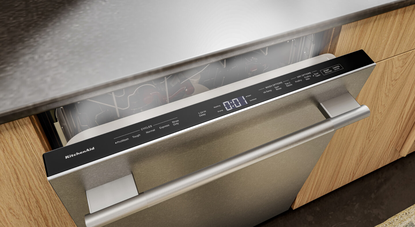 Close-up of top control dishwasher cracked open and releasing steam