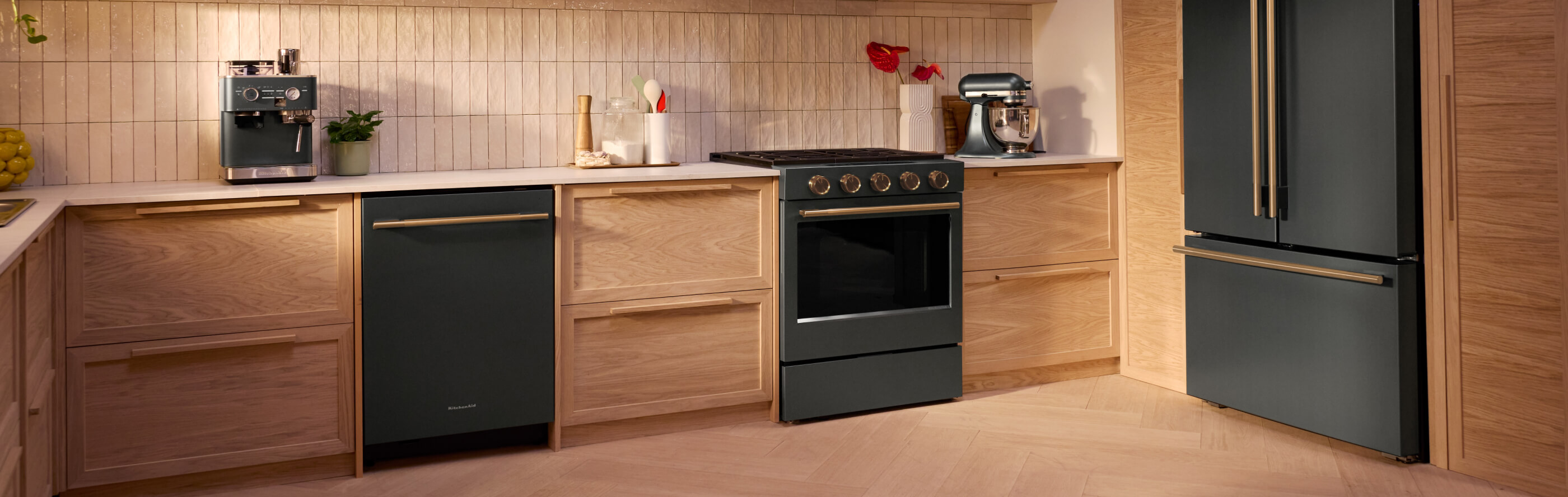 KitchenAid® suite of Juniper appliances in natural wood cabinetry