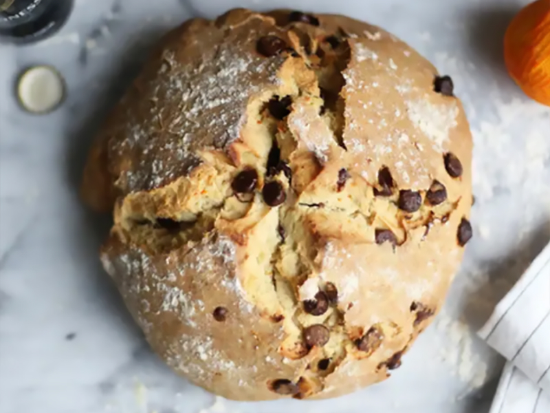 A loaf of bread with chocolate chips baked inside A loaf of bread with chocolate chips baked inside