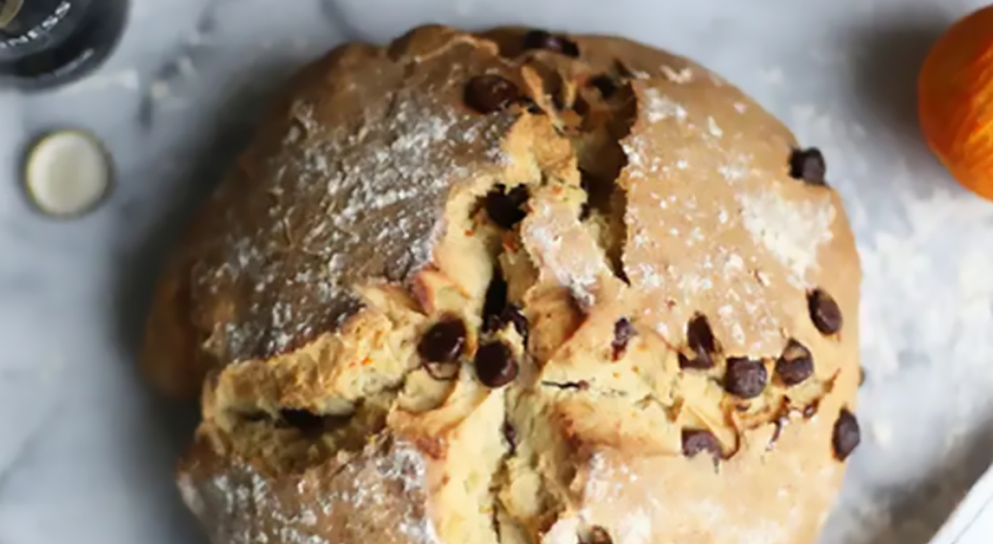 A loaf of bread with chocolate chips baked inside A loaf of bread with chocolate chips baked inside
