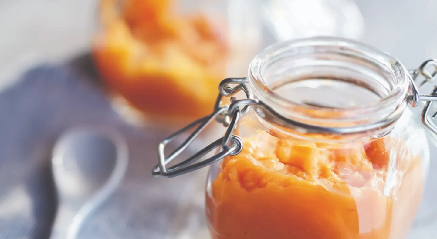 Homemade pumpkin puree in glass jar Homemade pumpkin puree in glass jar