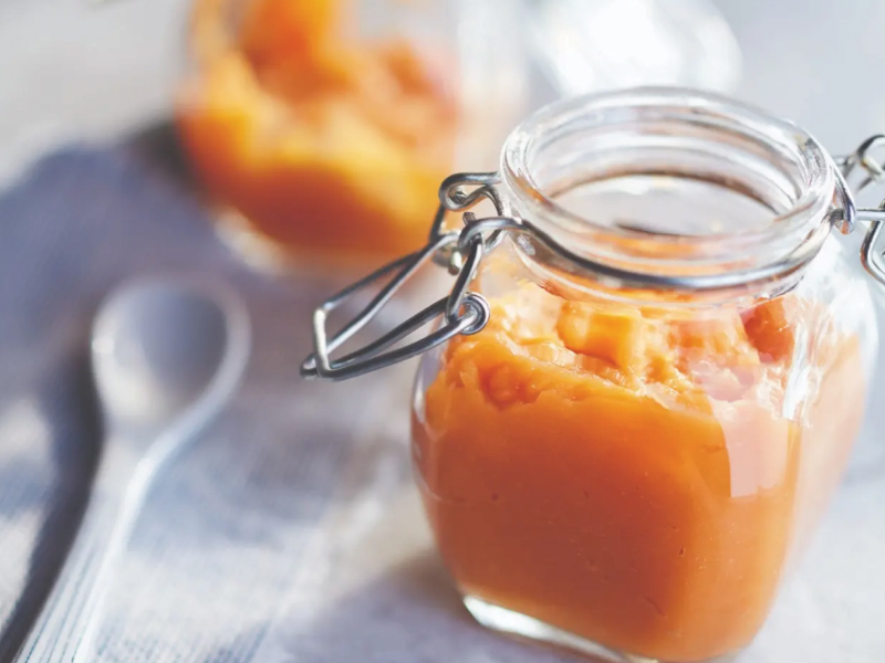 Homemade pumpkin puree in glass jar Homemade pumpkin puree in glass jar