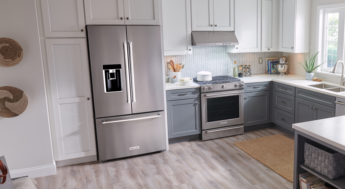 Stainless steel, KitchenAid® French-door refrigerator in white cabinetry Stainless steel, KitchenAid® French-door refrigerator in white cabinetry