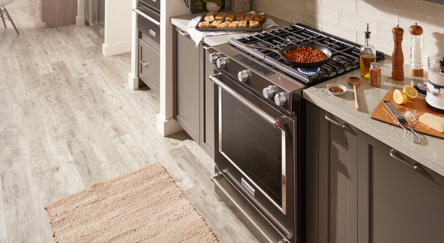 A dish cooking on a KitchenAid® gas stove A dish cooking on a KitchenAid® gas stove