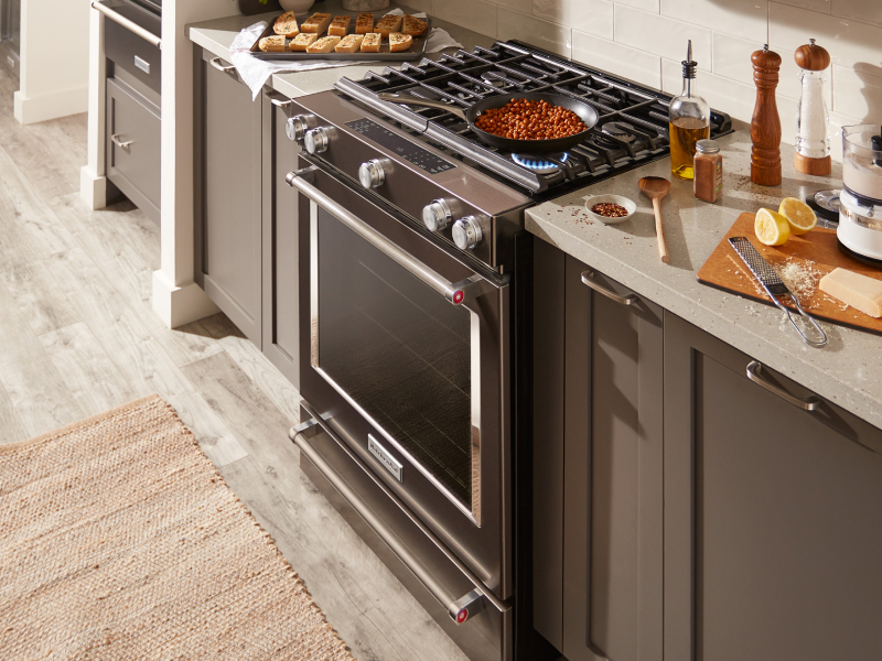 A dish cooking on a KitchenAid® gas stove A dish cooking on a KitchenAid® gas stove