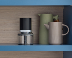 A KitchenAid Go™ Cordless Top Down Chopper on a shelf