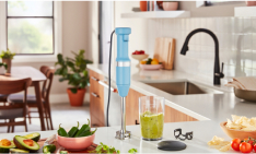 A KitchenAid® Go™ Cordless Top Down Chopper on a kitchen shelf.