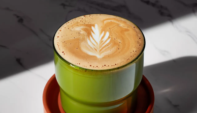 Flat white in a green ceramic cup