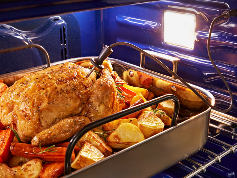 A turkey cooking in a KitchenAid® wall oven