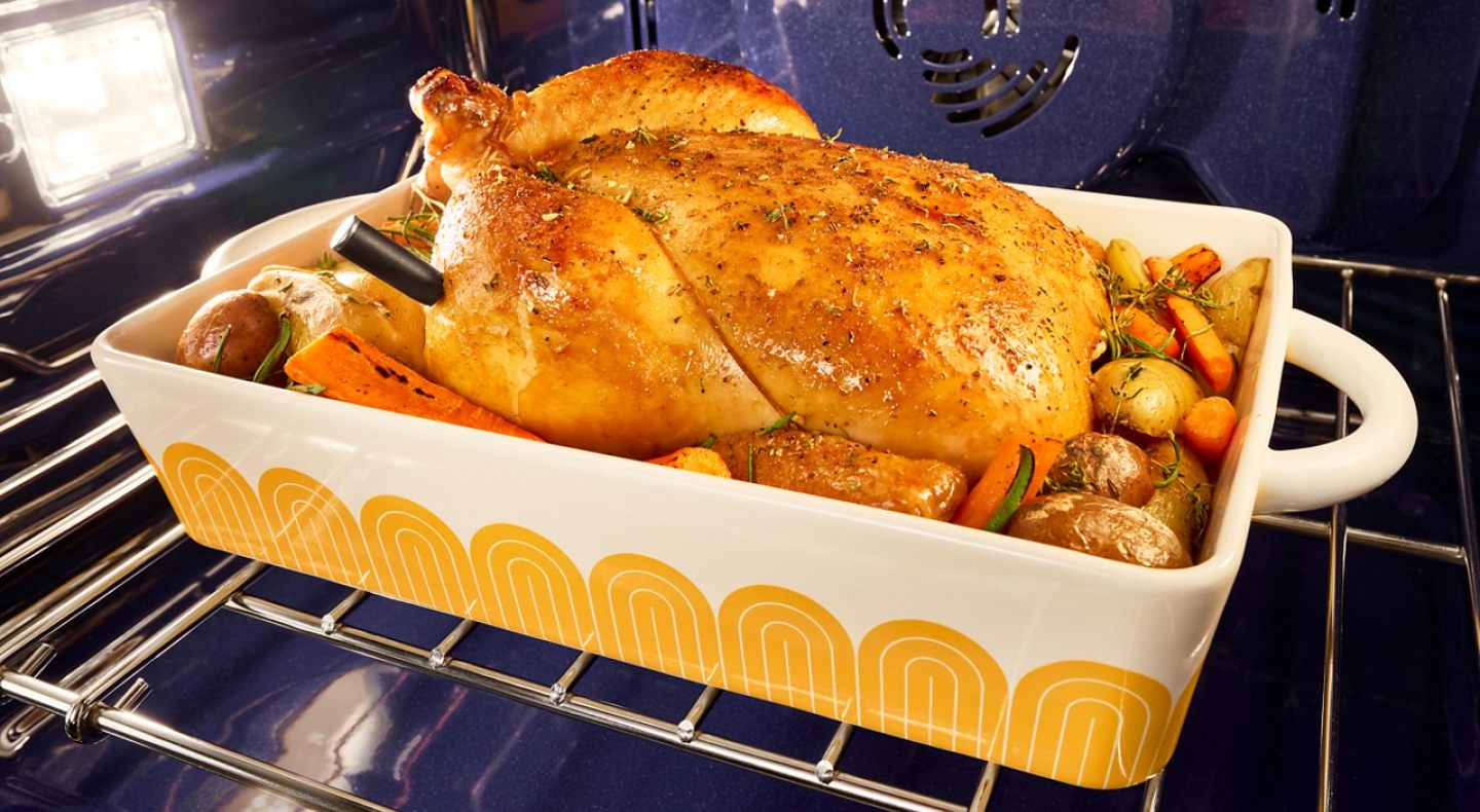 A cooked turkey and vegetables in a KitchenAid® wall oven A cooked turkey and vegetables in a KitchenAid® wall oven