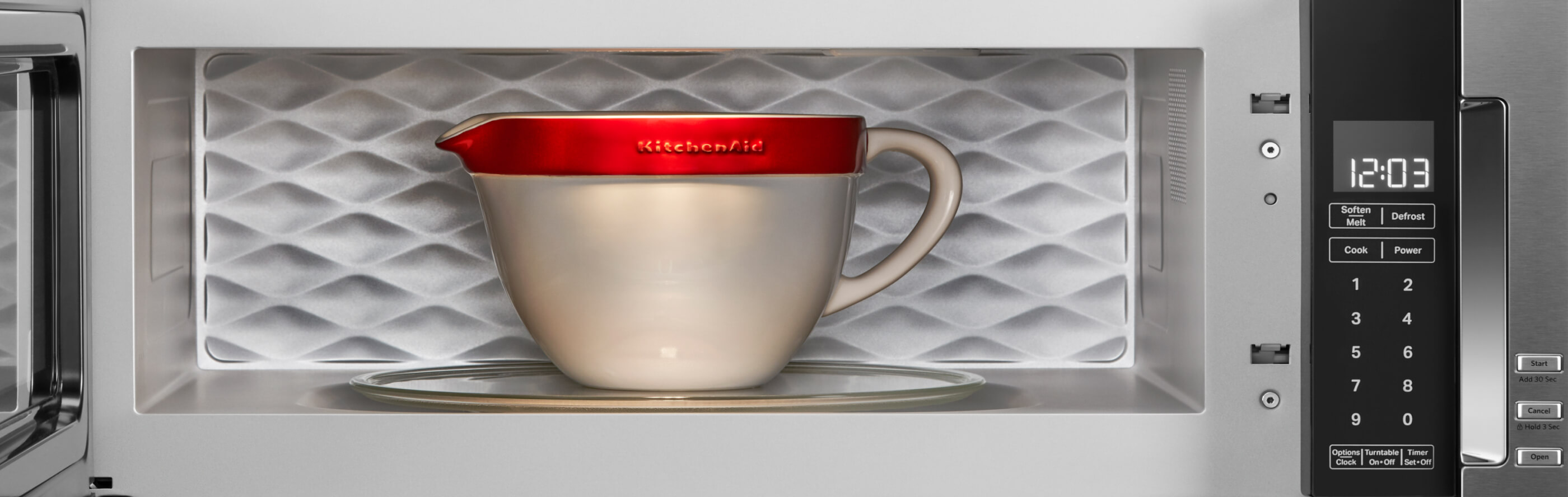 KitchenAid brand dishware inside a KitchenAid® low profile microwave