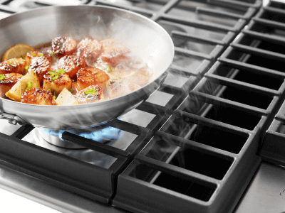 Food cooking on a cooktop Food cooking on a cooktop