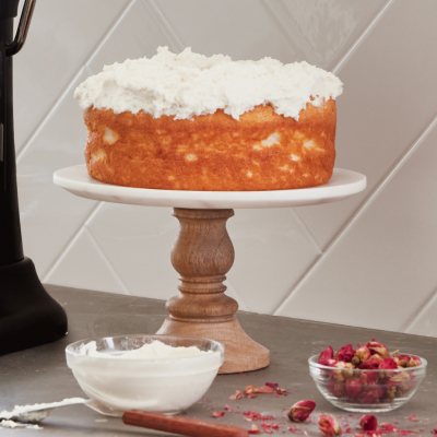 Cake layers and ingredients on a counter