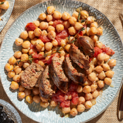 Sausage on a bed of garbanzo beans