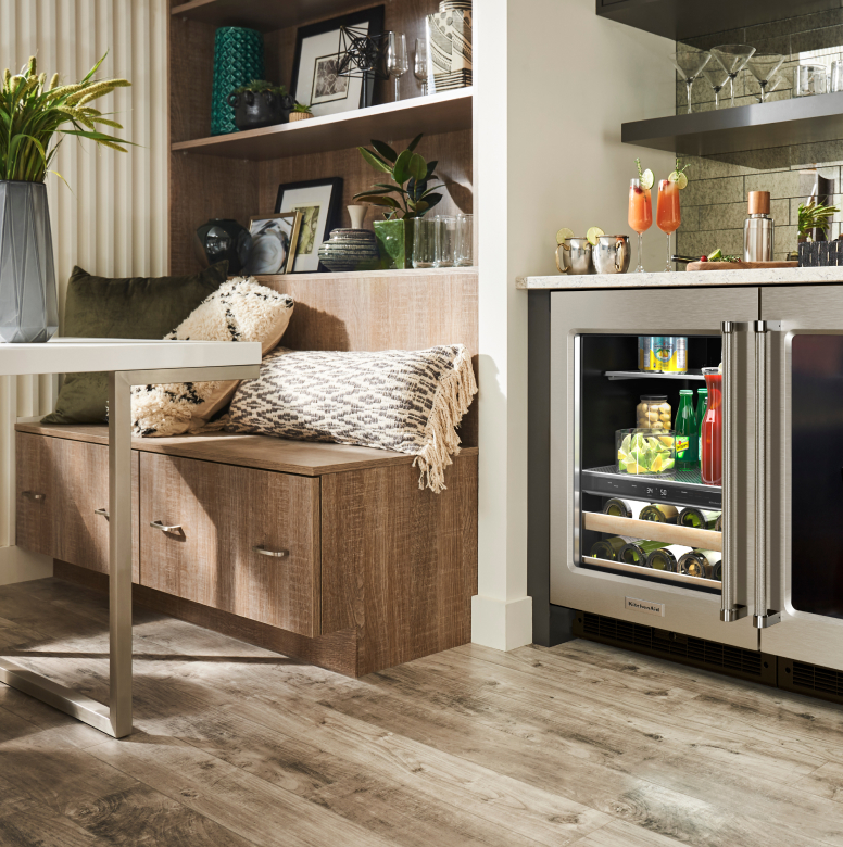 Undercounter refrigerator next to banquette