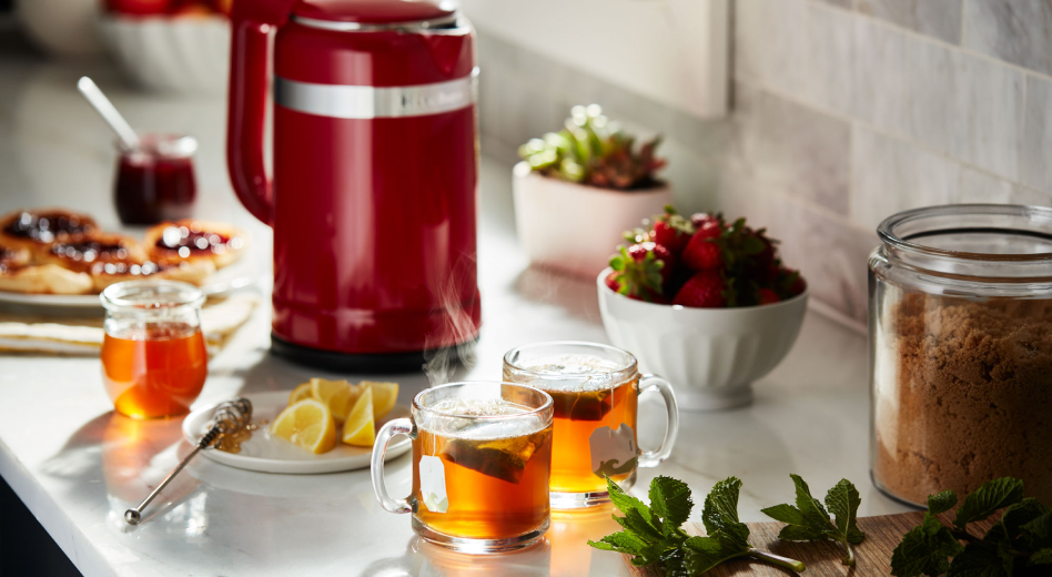 KitchenAid® electric kettle and two cups of tea KitchenAid® electric kettle and two cups of tea