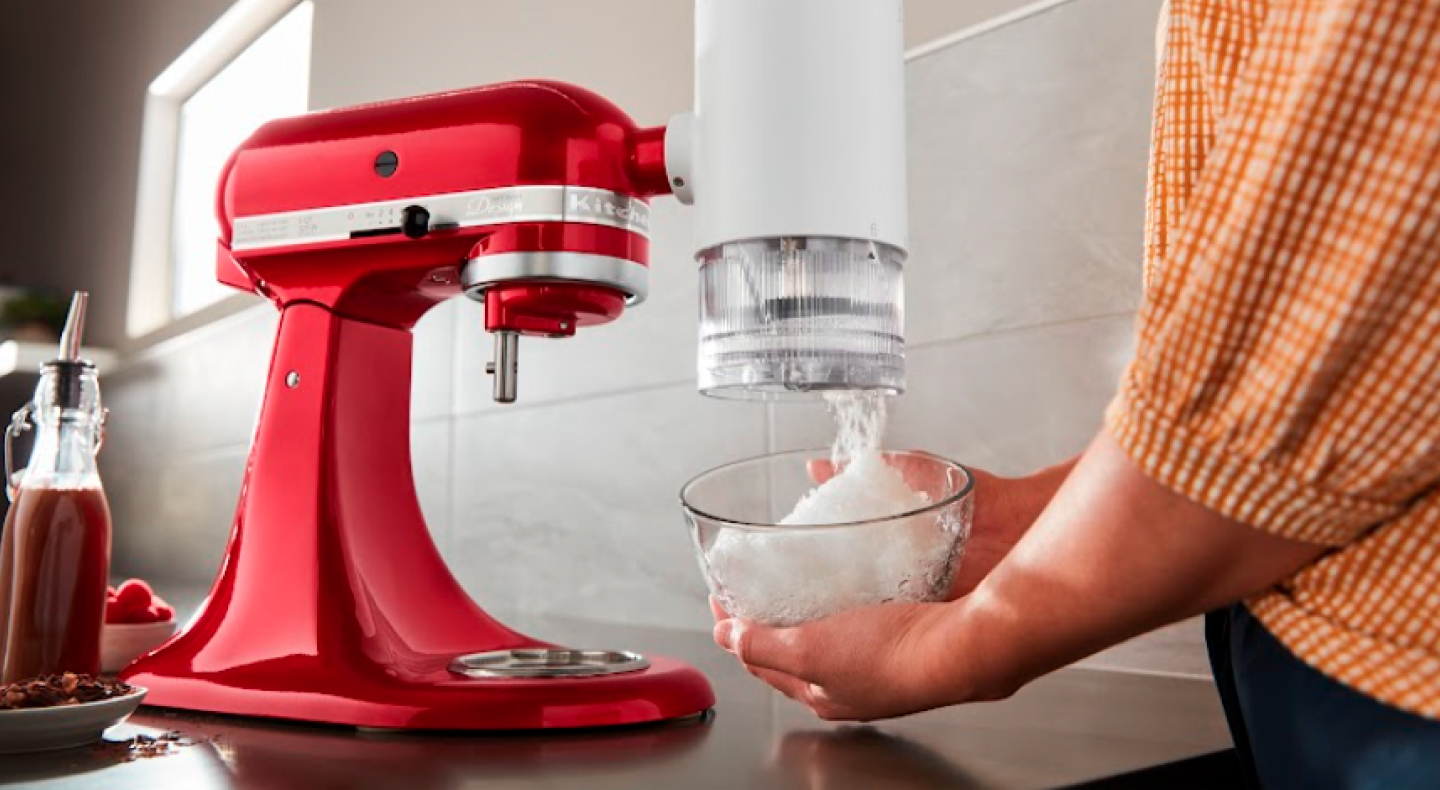 Red KitchenAid® stand mixer with the Shave Ice Attachment. Red KitchenAid® stand mixer with the Shave Ice Attachment.