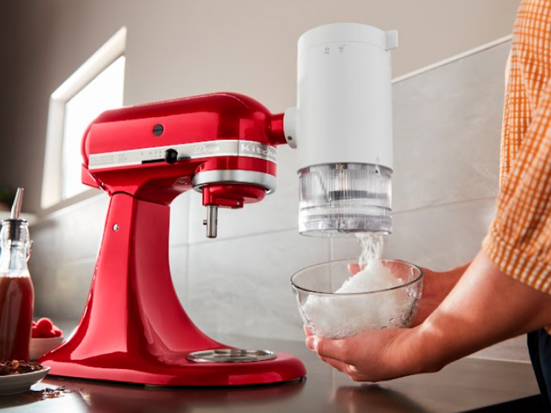 Red KitchenAid® stand mixer with the Shave Ice Attachment. Red KitchenAid® stand mixer with the Shave Ice Attachment.