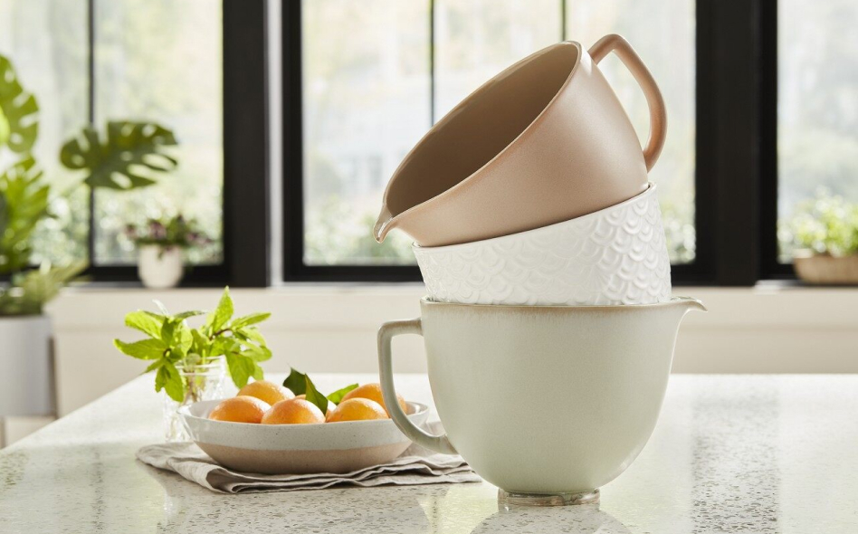 A stack of mixer bowls A stack of mixer bowls