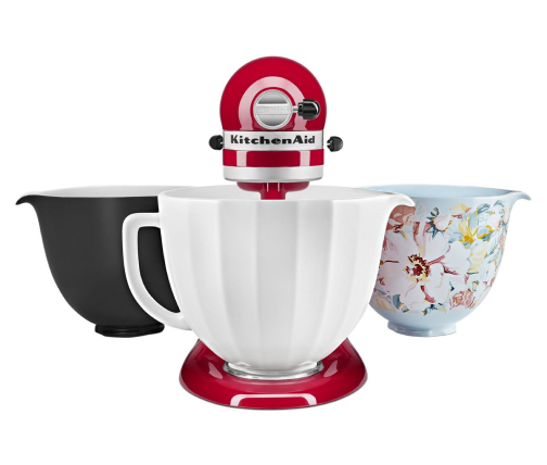 Red stand mixer with three ceramic bowls that are interchangeable