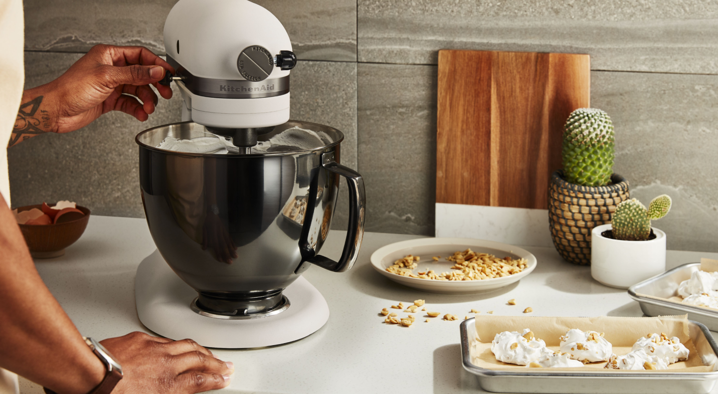 White KitchenAid® stand mixer on a countertop White KitchenAid® stand mixer on a countertop