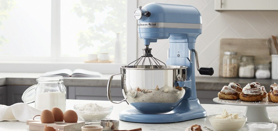 Blue Velvet bowl-lift stand mixer on countertop surrounded by cooking ingredients Blue Velvet bowl-lift stand mixer on countertop surrounded by cooking ingredients