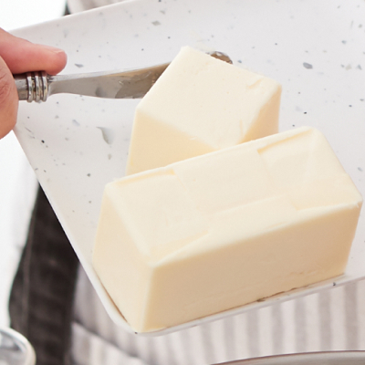 Shortening being cut