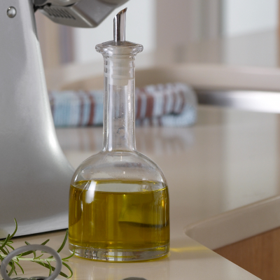 Cruet containing olive oil