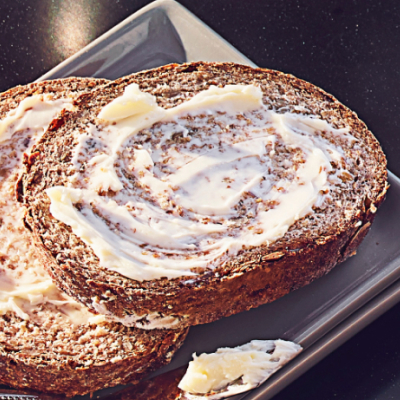 Buttered toast on baking sheet