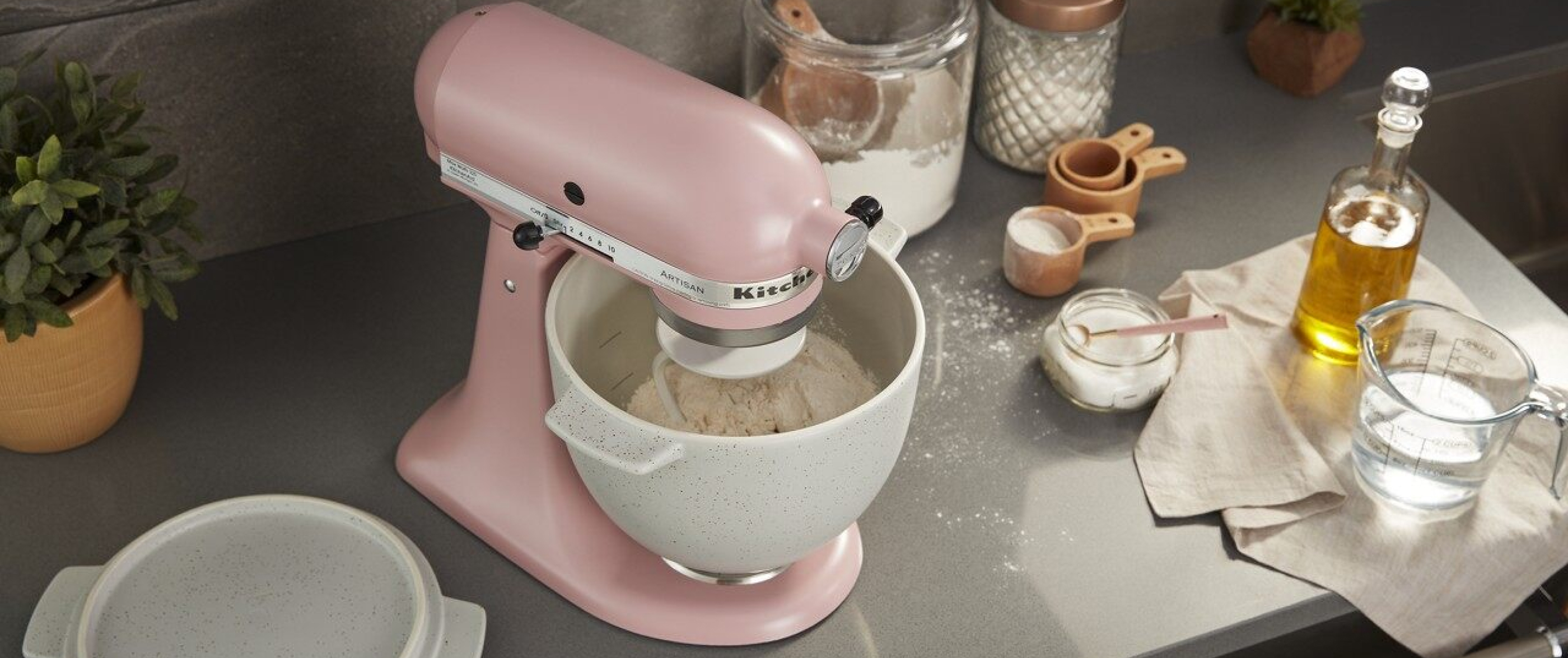KitchenAid® stand mixer on countertop with baking ingredients