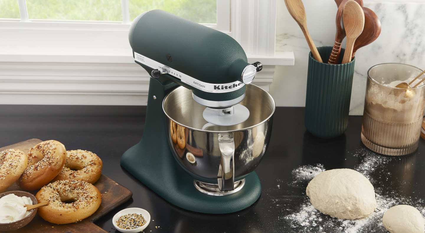 KitchenAid® stand mixer with dough and homemade bagels KitchenAid® stand mixer with dough and homemade bagels