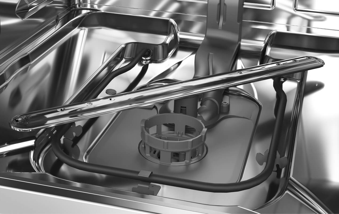 Close up of a dishwasher spray arm and filter Close up of a dishwasher spray arm and filter