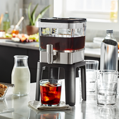 KitchenAid® Cold Brew Maker next to cold brew ingredients