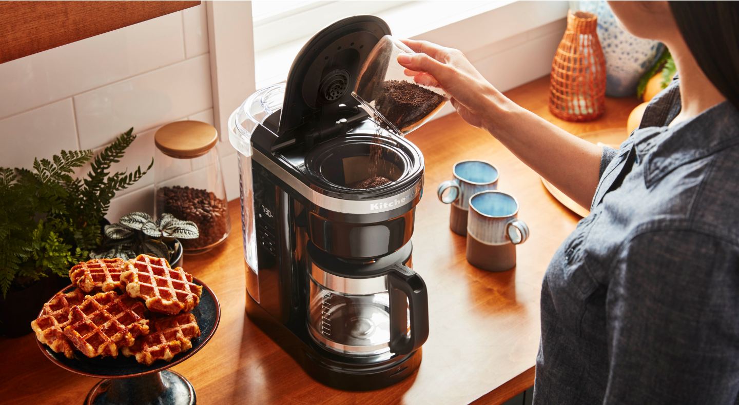 Person making coffee with a KitchenAid® Drip Coffee Maker Person making coffee with a KitchenAid® Drip Coffee Maker